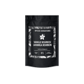 Sachet noir epicessignatures contenant de la vanille Bourbon de Madagascar, étiquette élégante avec motifs floraux.